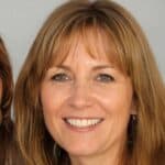 Woman with brown hair smiling